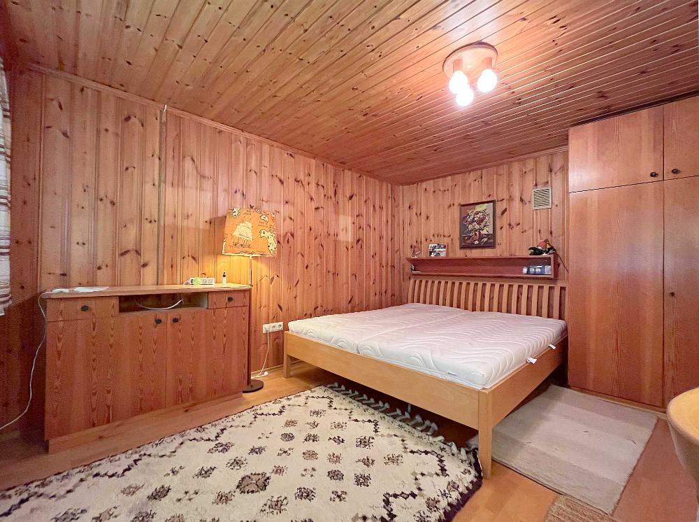 i Schlafzimmer - Badesiedlung Altenberg: Ferienhaus auf großer Freizeitliegenschaft